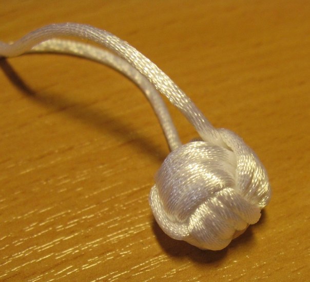 How do you tie a decorative knot?