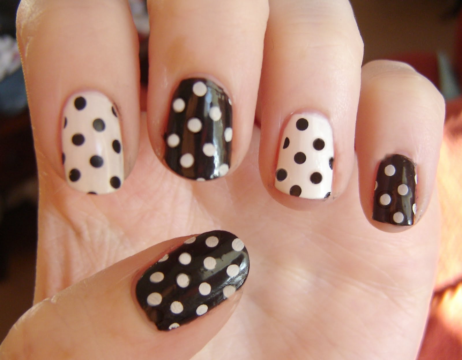 black and white polka dots nails