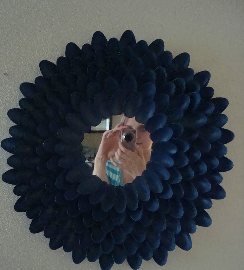 Flower mirror from plastic spoons