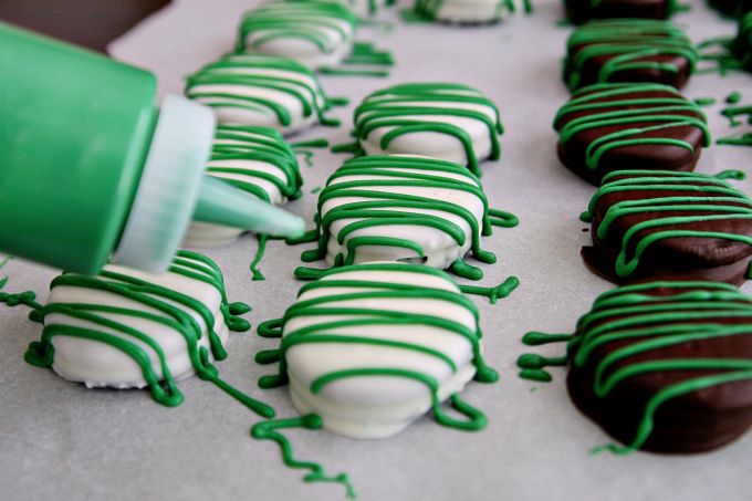 Chocolate covered mint oreos with green drizzle