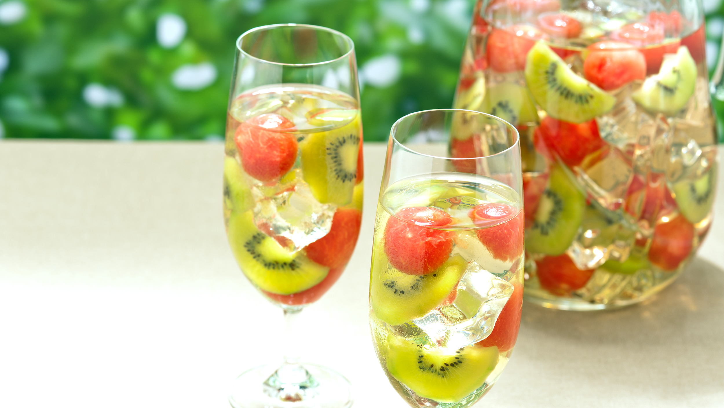 Kiwi Melon Sangria in in a pitcher and in nice colors