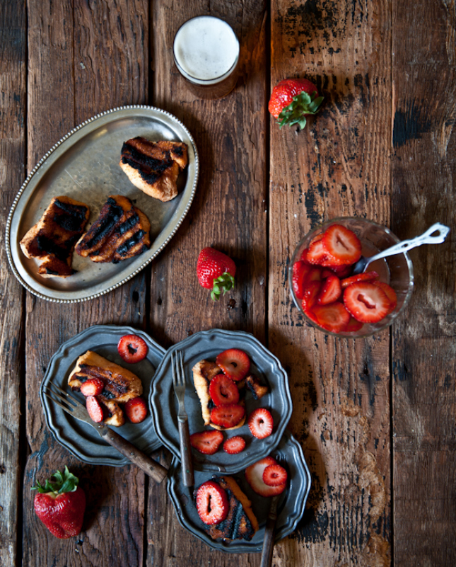Grilled angel food cake with beer macerated strawberries