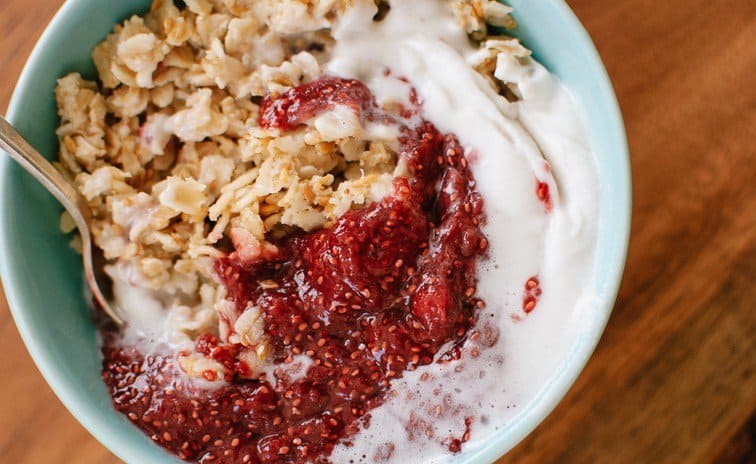 Toased oatmeal with strawberry chia jam and coconut whipped cream