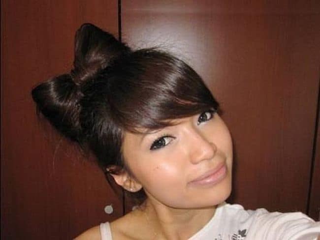 Hair bow and swooping bangs style