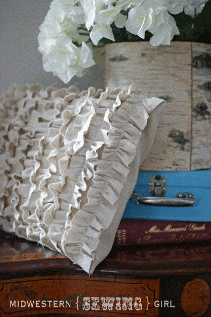 Delicate ruffled pillow covering