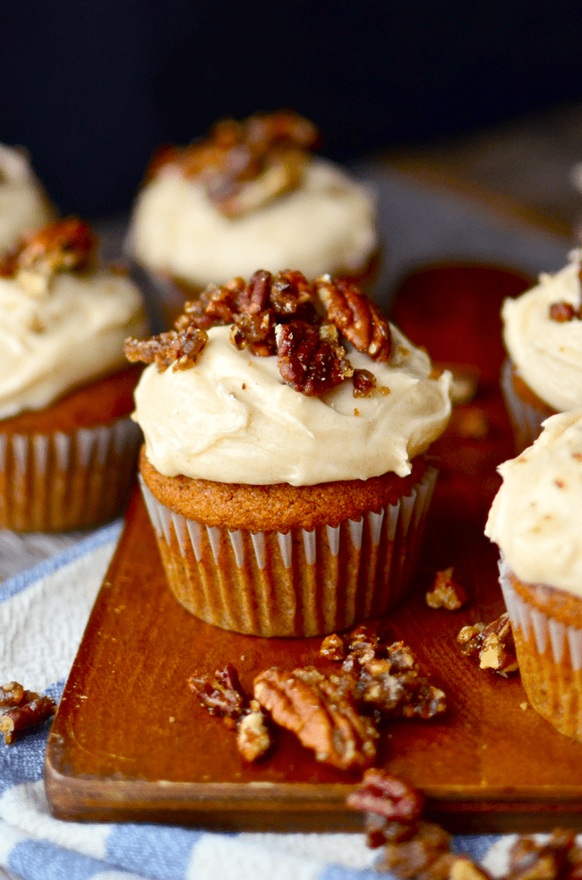 Pumpkin cupcakes with browned butter cream cheese frosting and sugar pecans