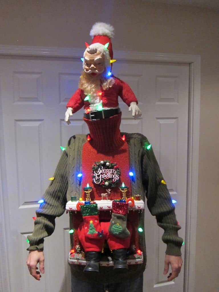 Stuck in the chimney sweater 15 DIY Ugly Christmas Sweaters that Are Gorgeous