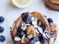 Vanilla bean blueberry lemon and cream cheese swirl sticky buns 200x150 15 Delicious Recipes Just for Vanilla Lovers