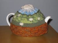 Counting sheep tea cozy 200x150 A Warm and Toasty Affair: 14 Adorable Knitted Tea Cozies