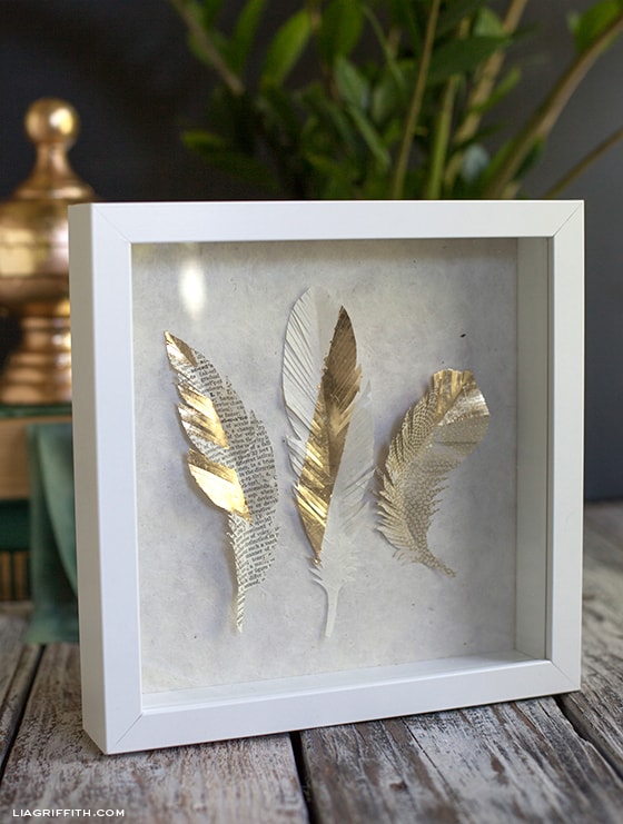 Golden paper feathers