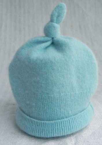 Knotted baby hat from a sweater
