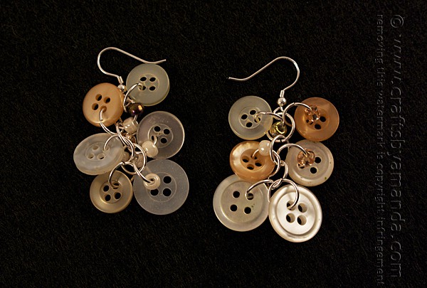 Dangling antique button earrings