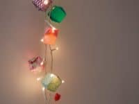 Paper origami string lights 200x150 Homemade Sparkle: 12 Awesome DIY Garden Light Ideas