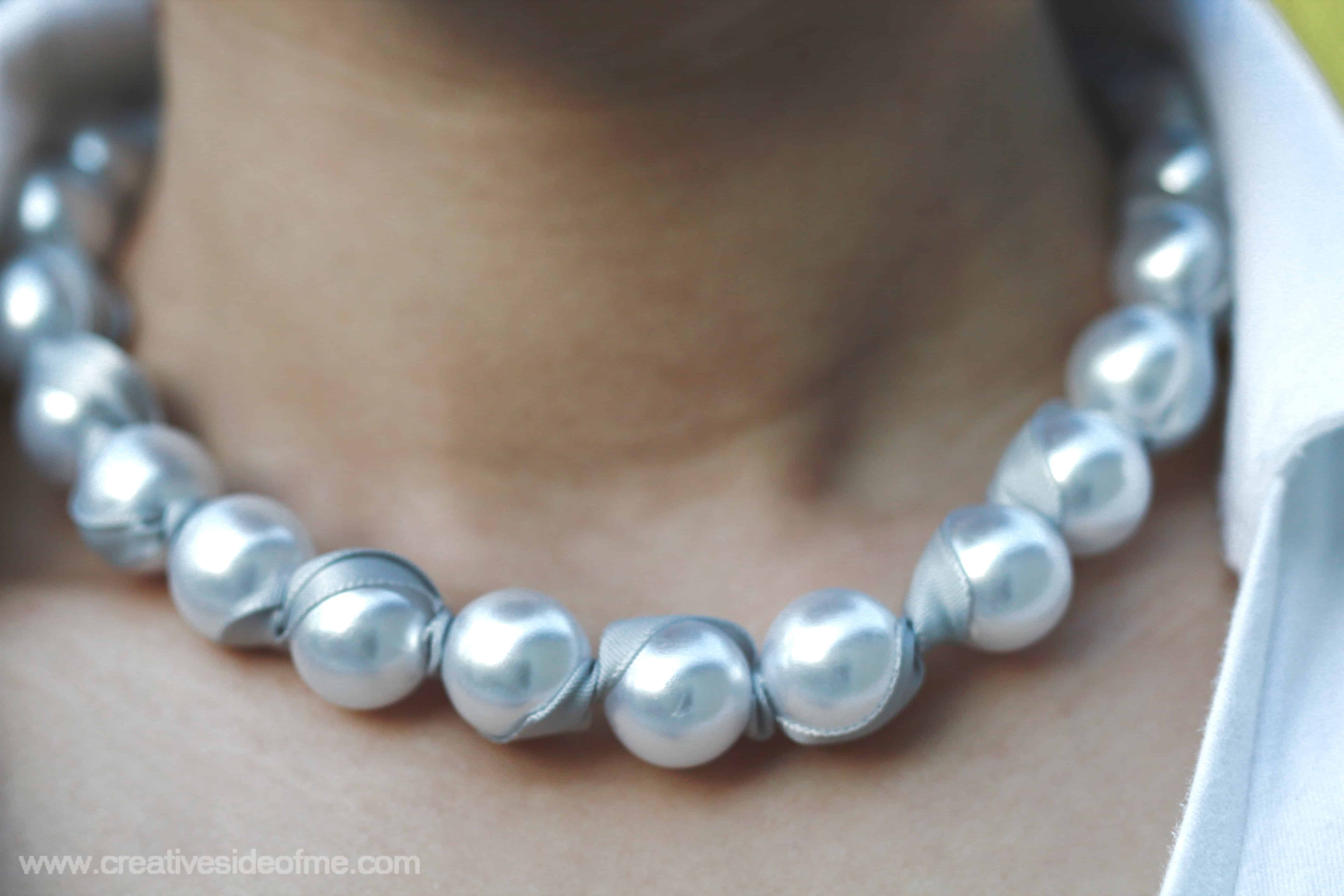 Ribbon woven pearl necklace