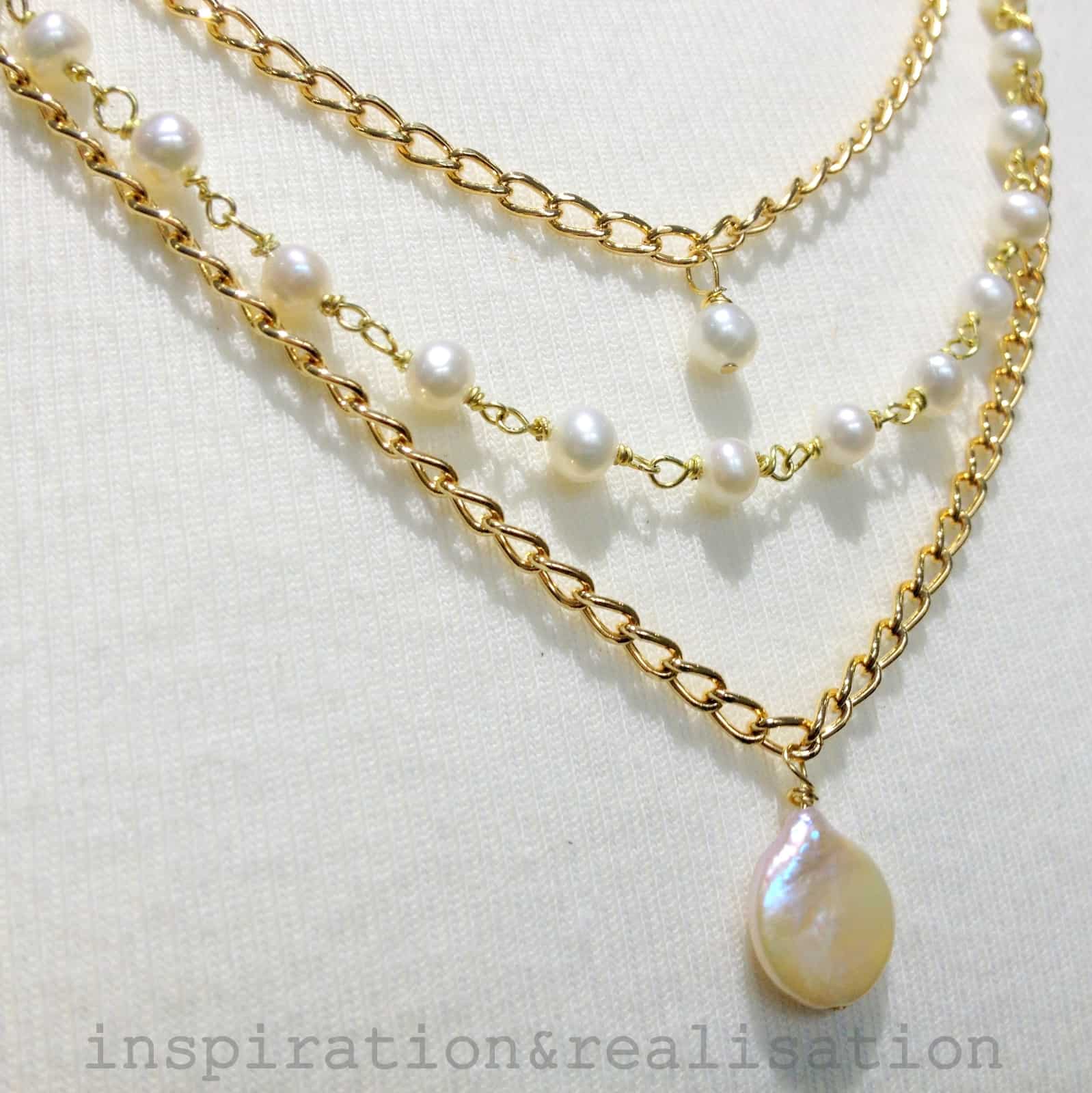 Triple strand pearl necklace