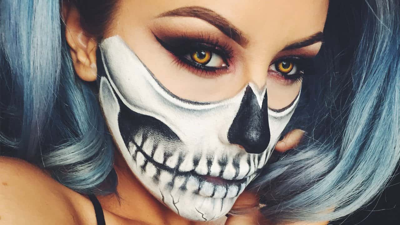 Half-face skeleton makeup