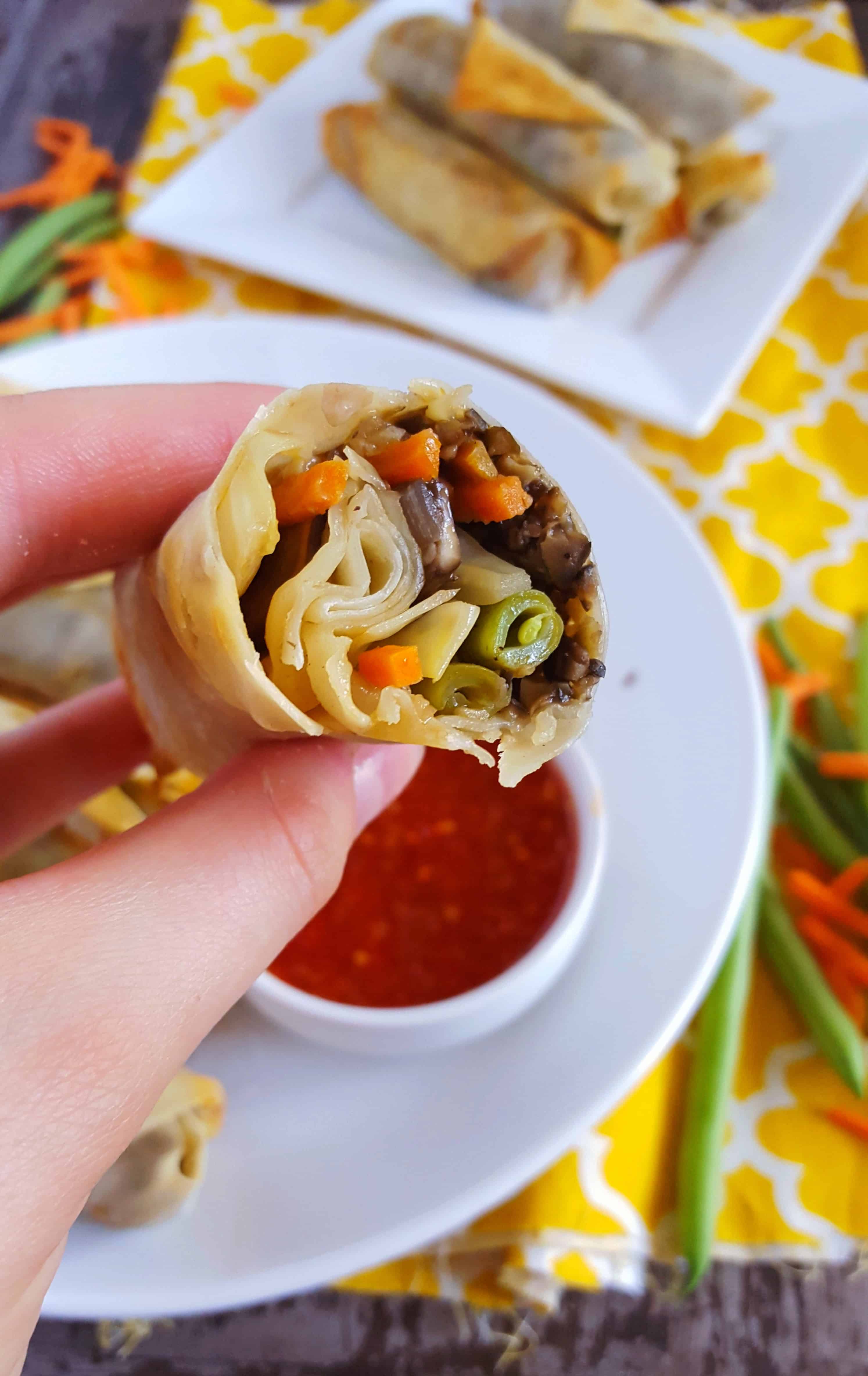 Baked veggie spring rolls with spicy black olive tempanade