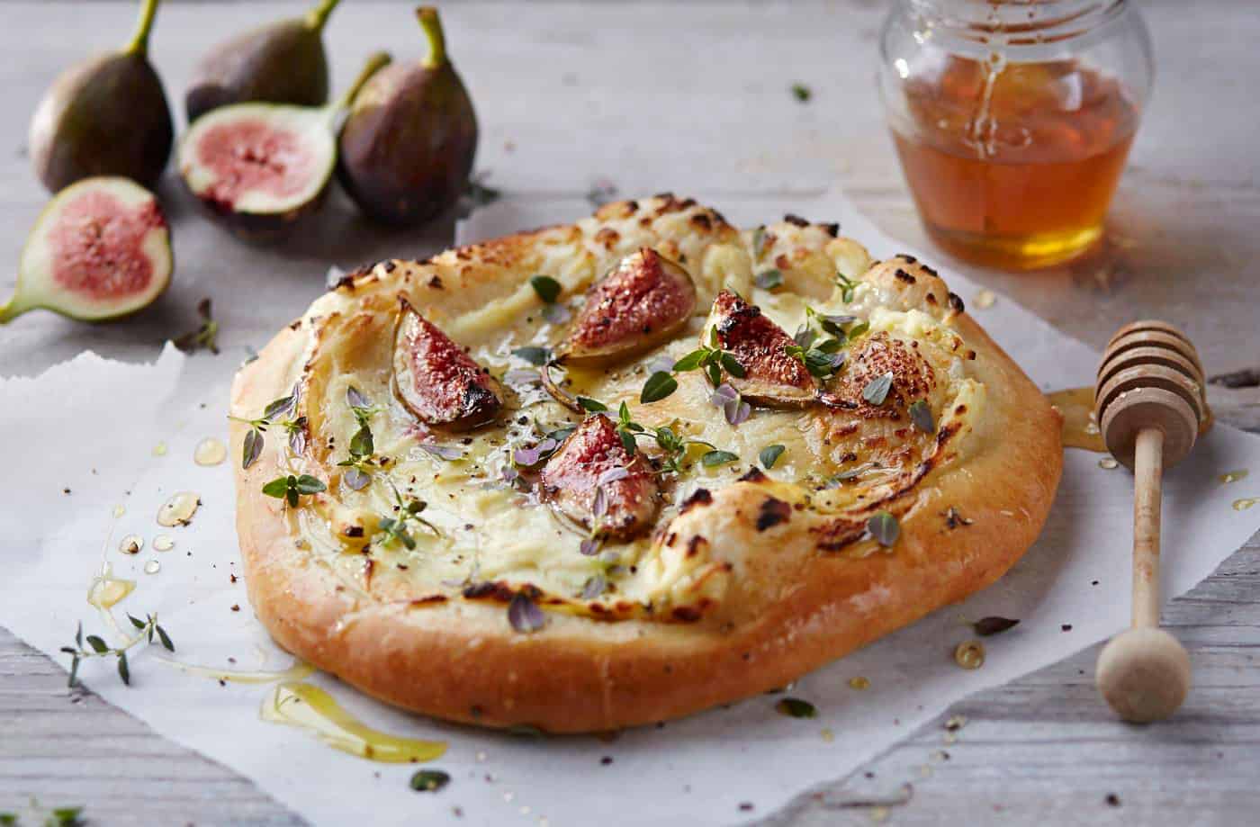 Pizza with fresh figs, ricotta, thyme, and honey