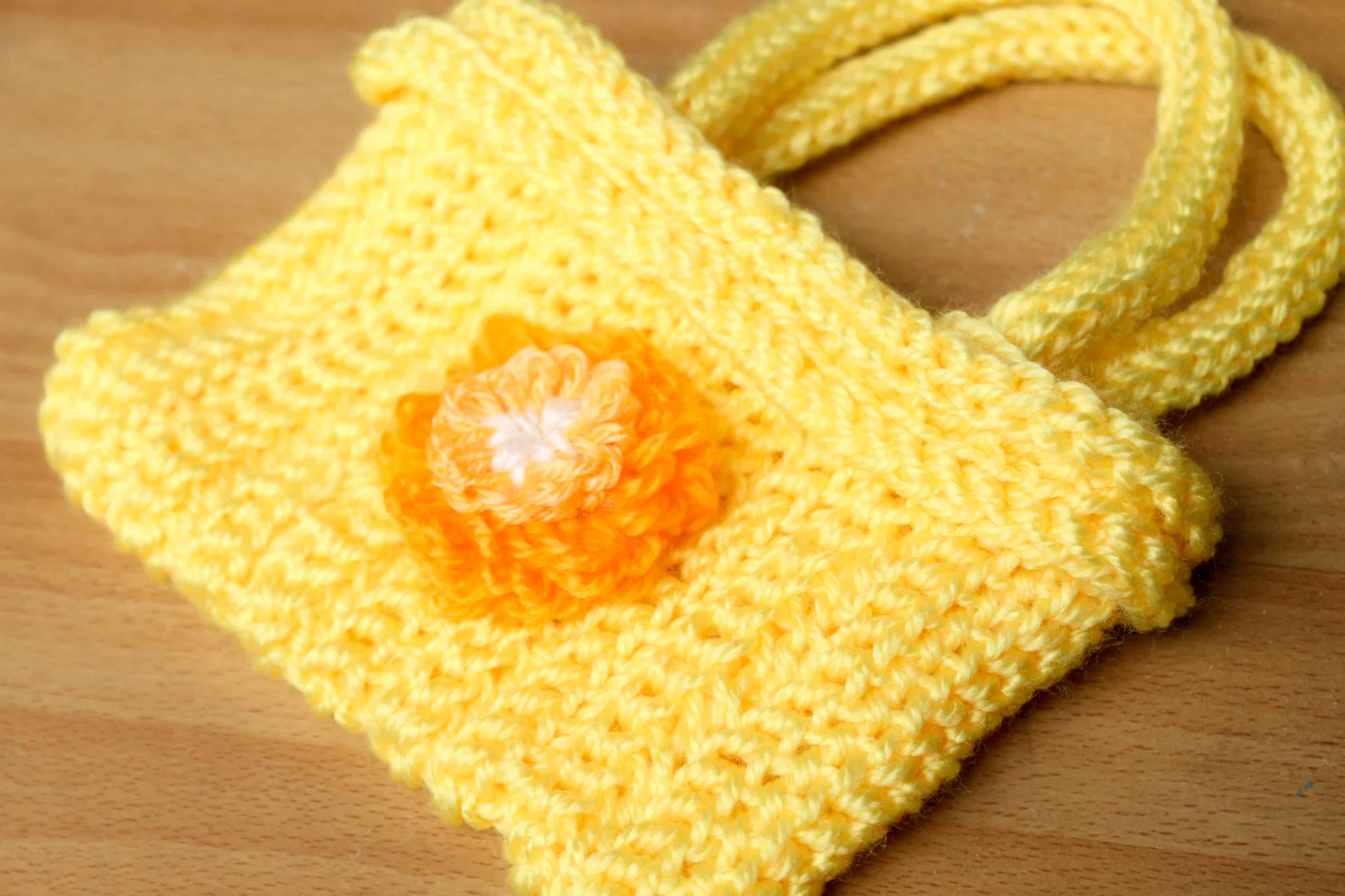 Small spool knit floral purse