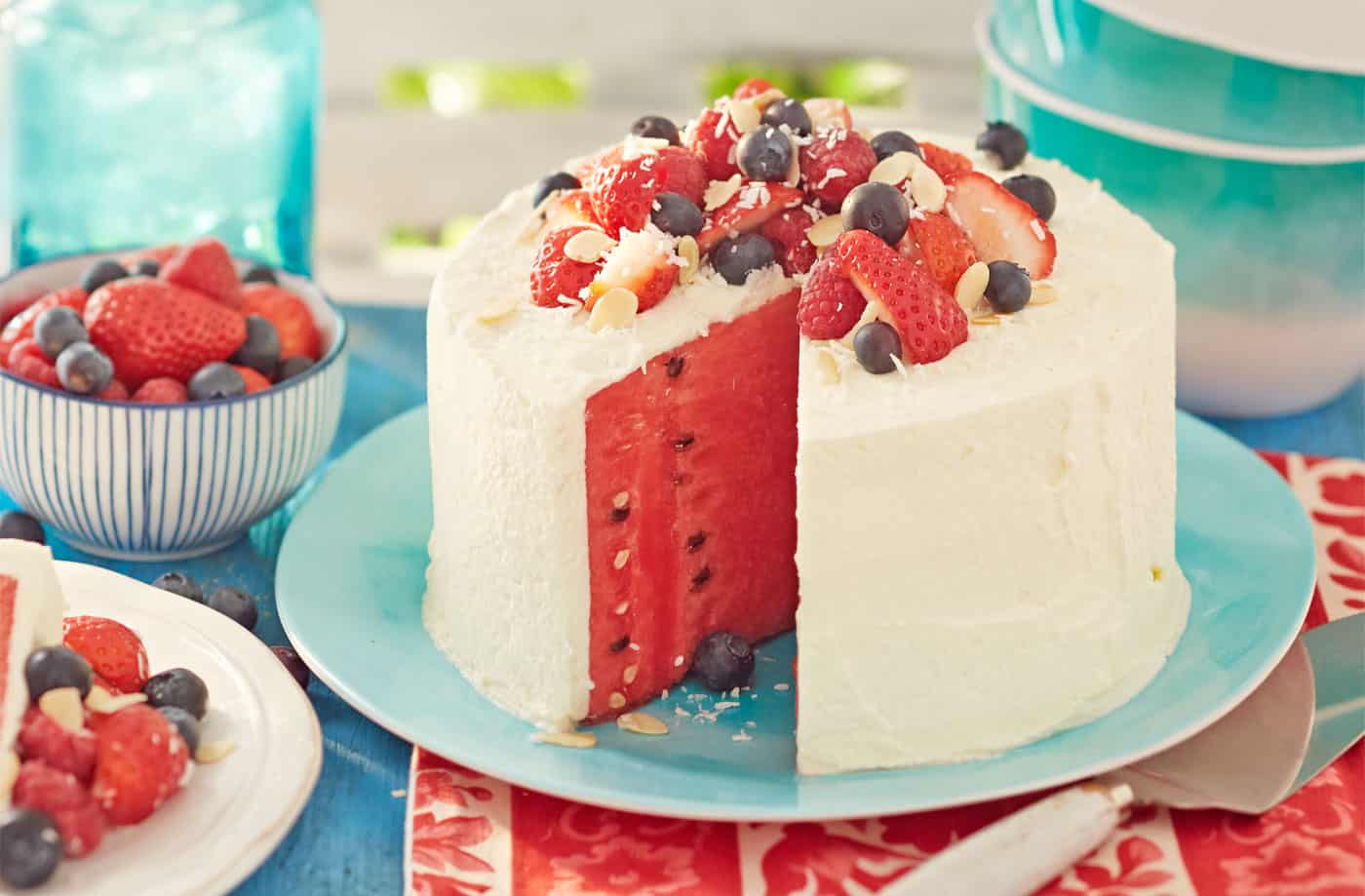 Berry topped, iced watermelon cake