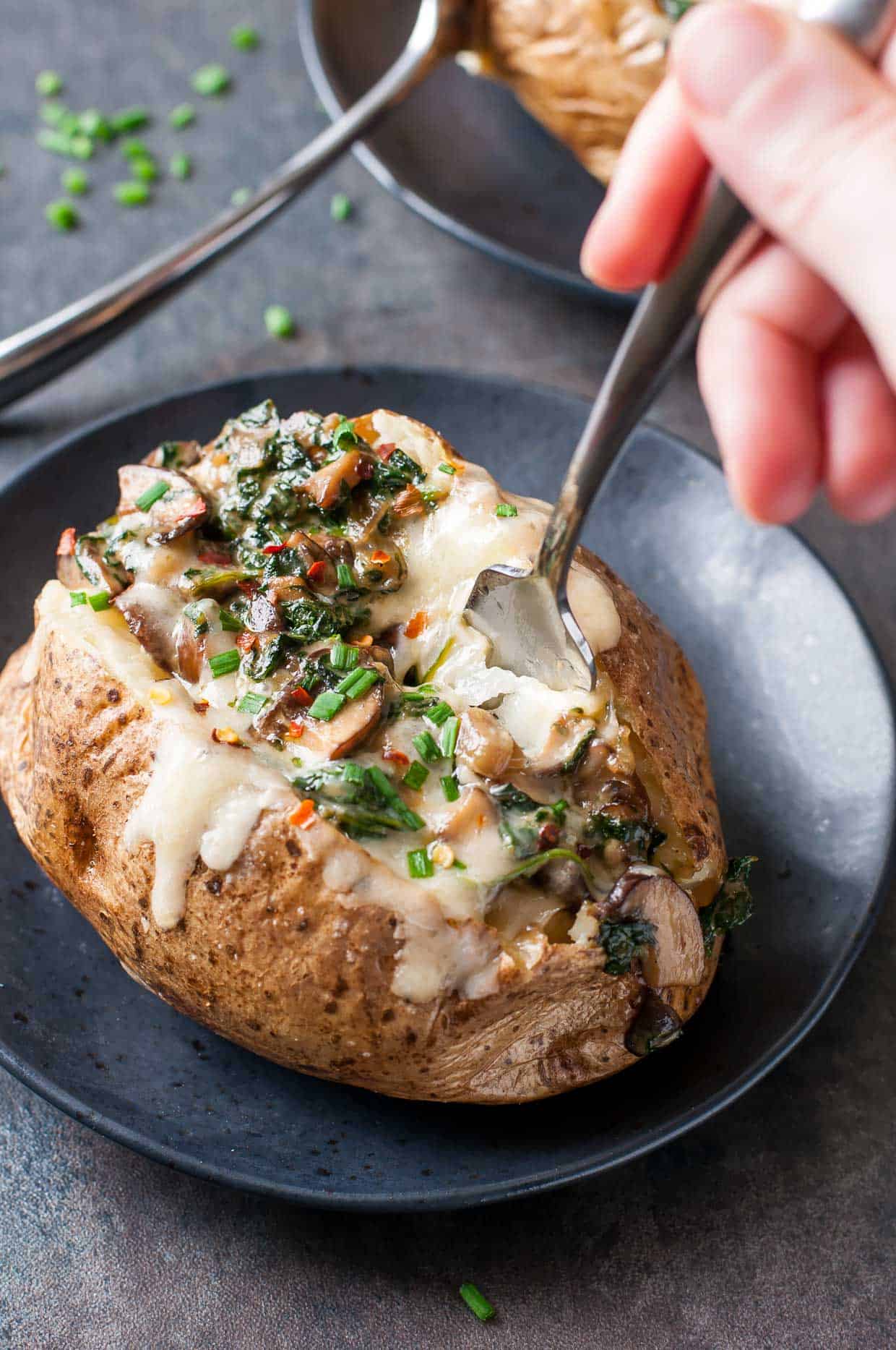 Cheesey vegetarian potato with spinach and mushrooms