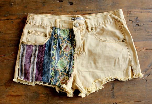 Asymmstrical fabric applique shorts