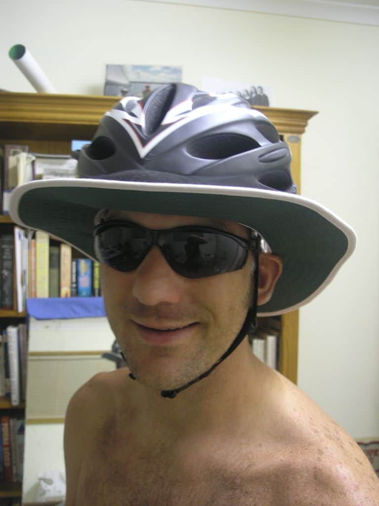 Protective sun brim for a bicycle helmet