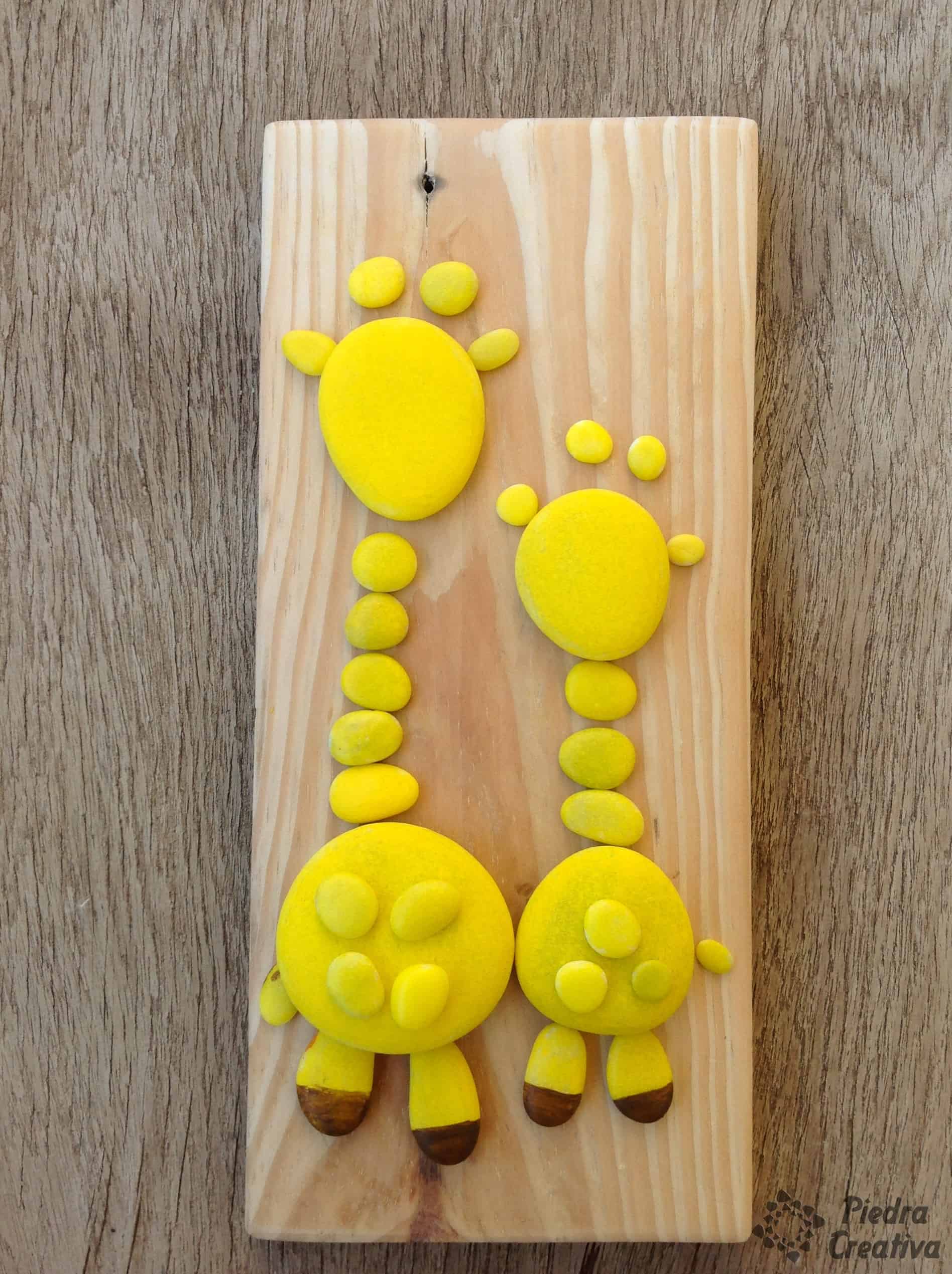 Wooden mounted giraffe rock painting