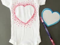 Negative space stencilled heart onesies 200x150 Innovative Patterns: DIY Projects Using Fabric Pens