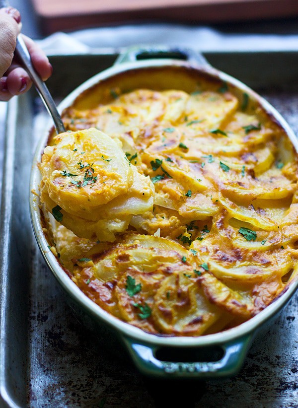 Creamy pumpkin and cheddar scallped potatoes