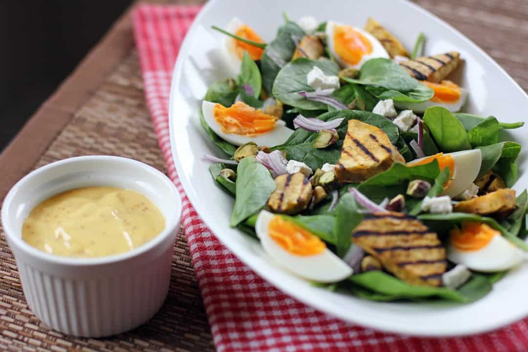 Golden sweet potato and baby spinch salad with egg