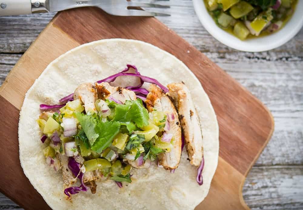Grilled chicken taco with green tomato salsa