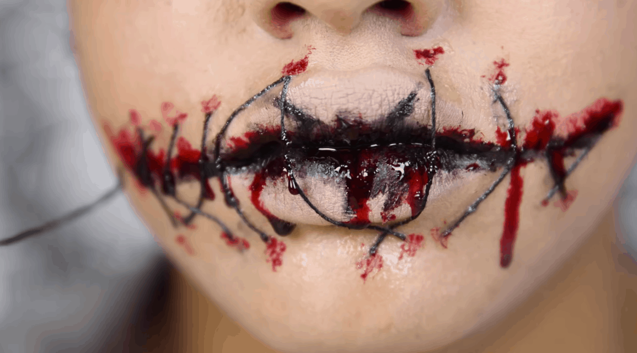 Stitched mouth and bloody lips
