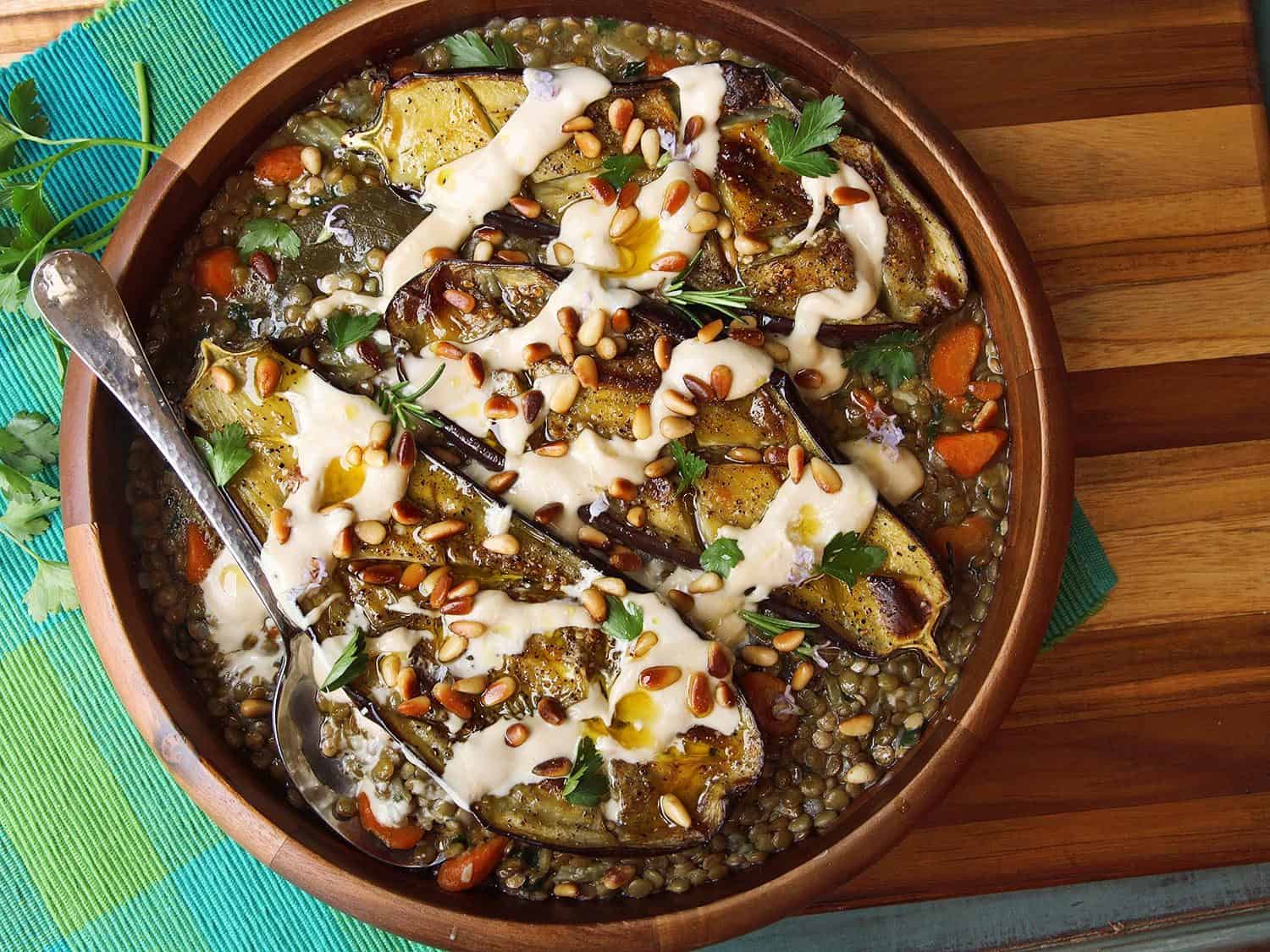 roasted eggplants with tahini, pine nuts, and lentils