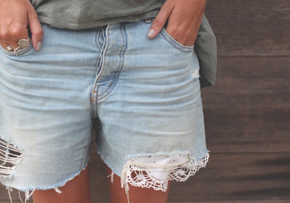 Denim shorts patched with lace