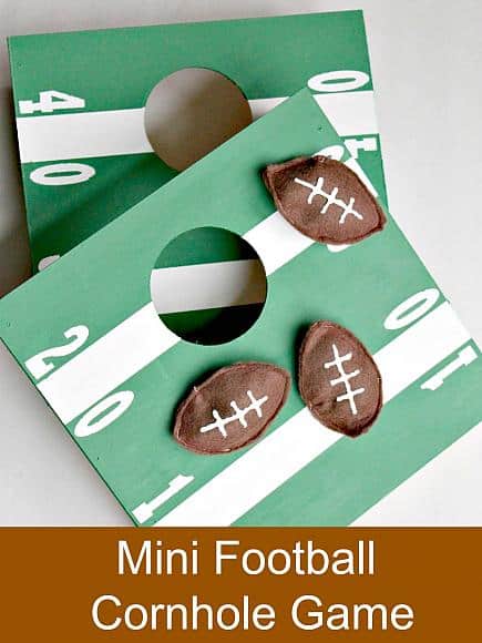 Miniature cornhole football game