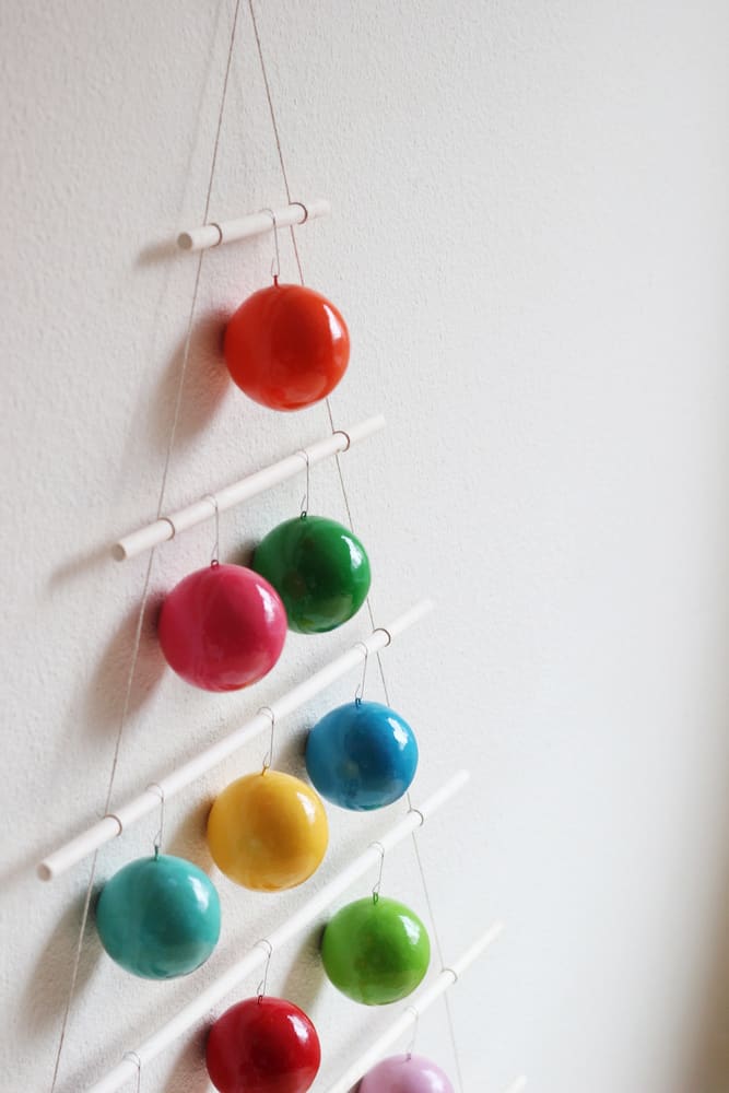 Modern dowel and ornaments tree hanging