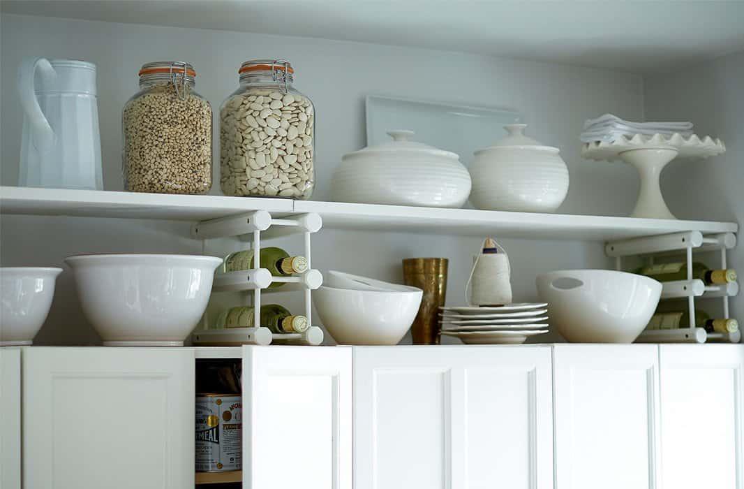 Extra shelf storage between cupboards and the ceiling