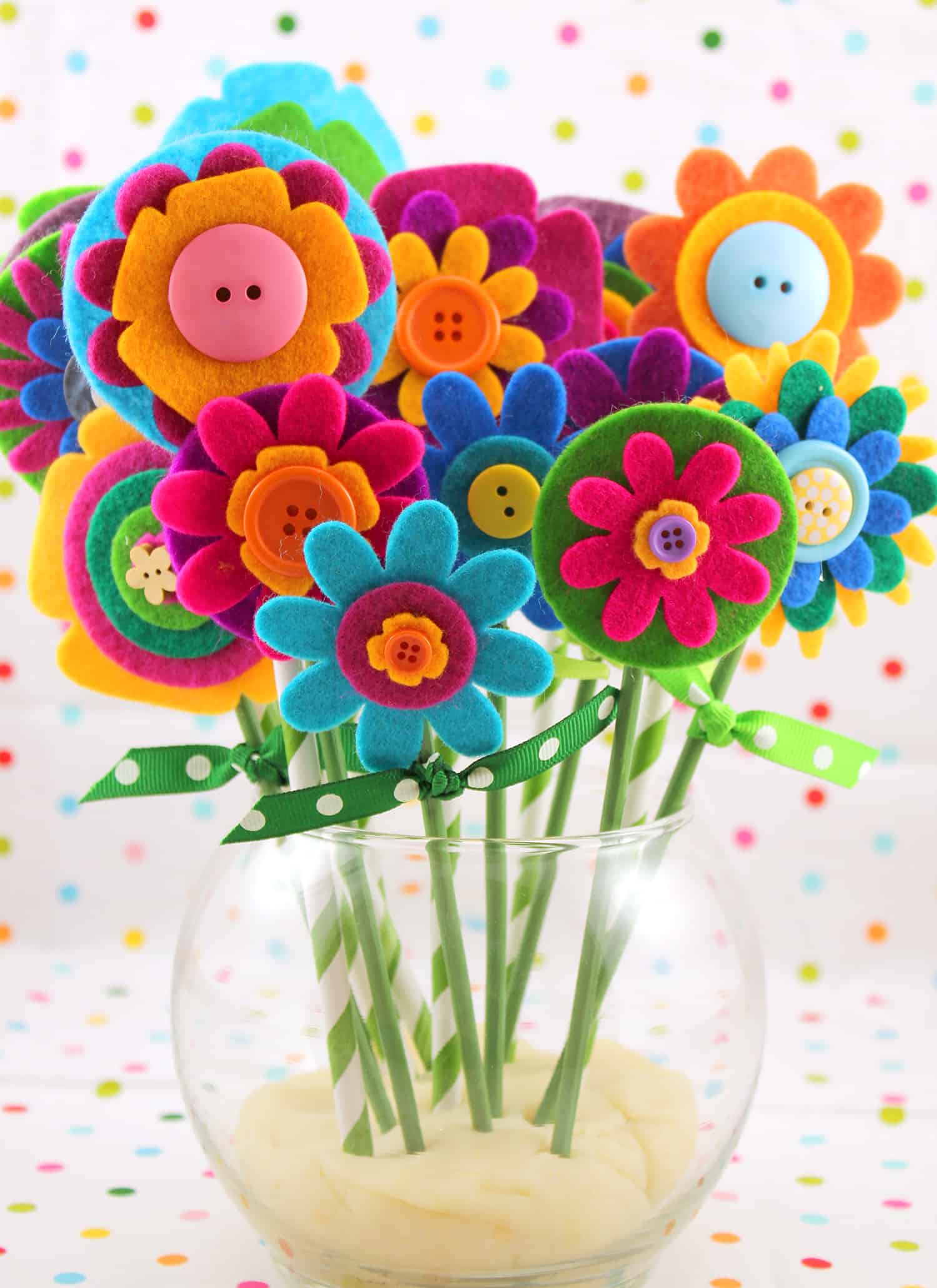 Felt, button, and straw flowers