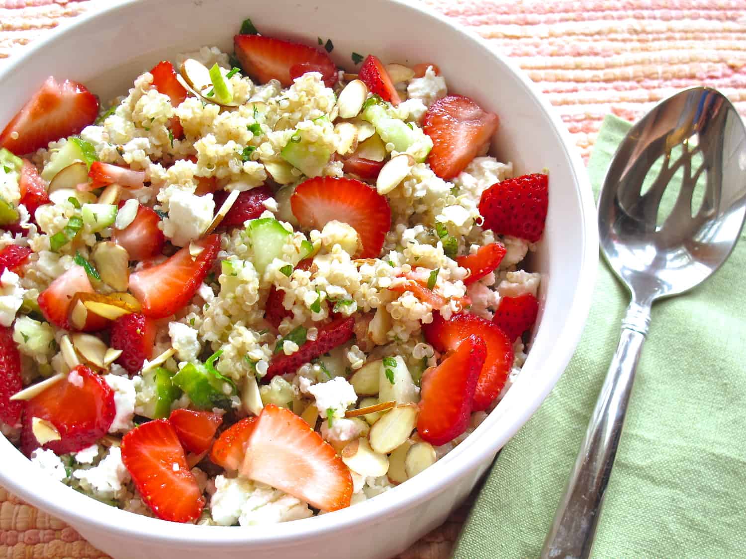 Quinoa salad with strawberries, almonds, and mint