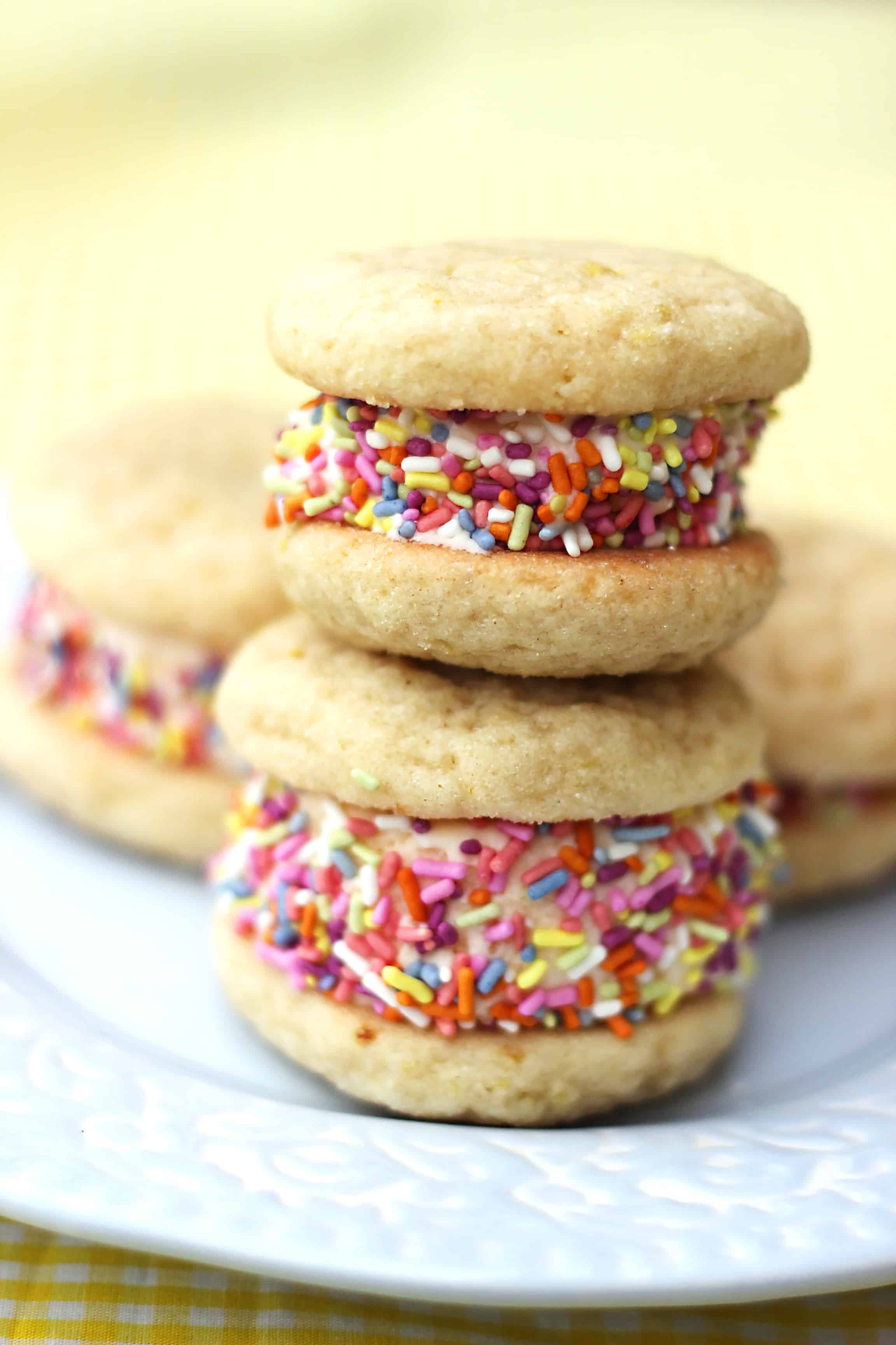 Lemon cookie ice cream sandwiches with rainbow sprinkles