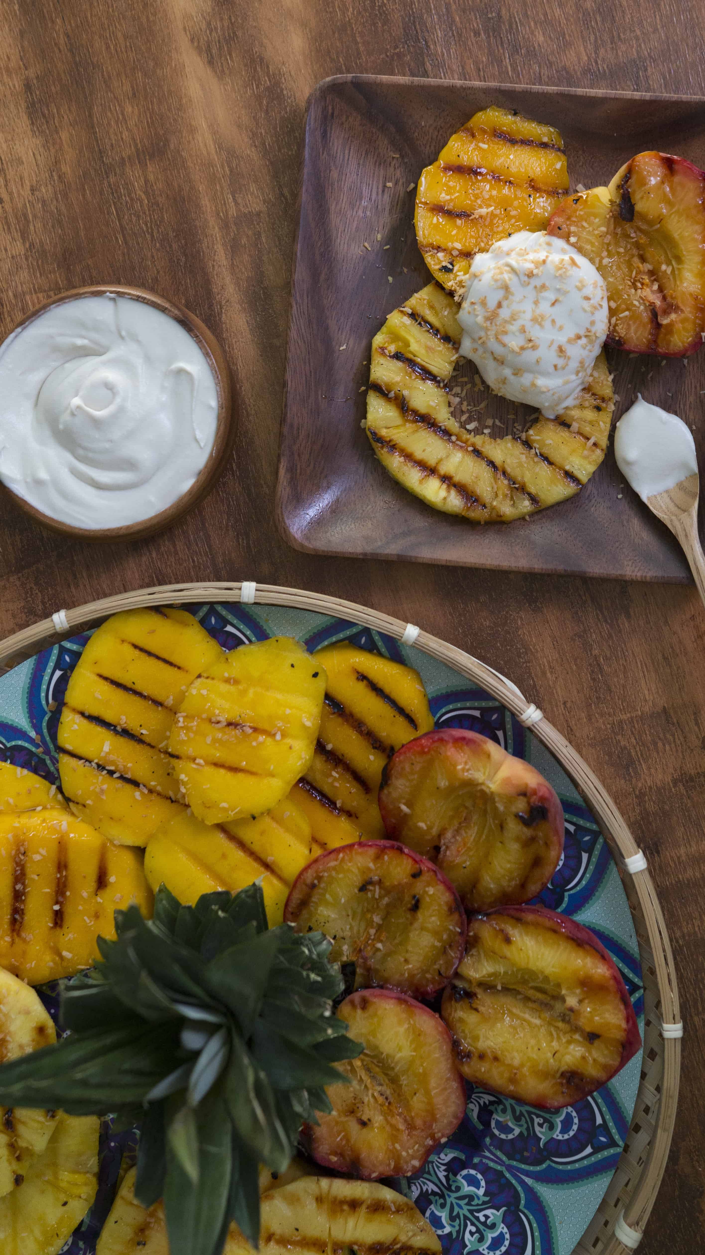 Grilled pineapple and peaches with coconut whipped cream