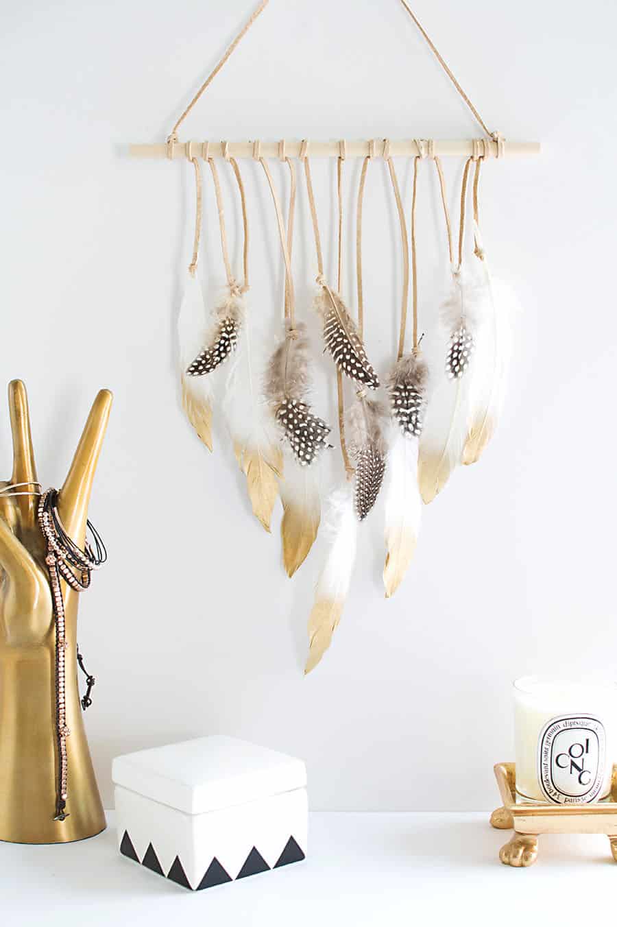 Feather and leather thong wall hanging