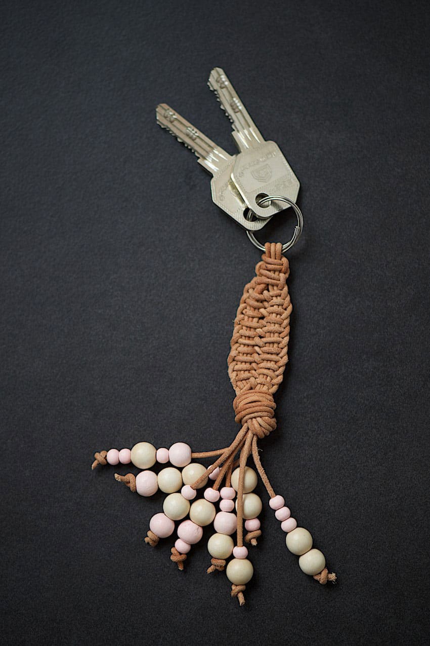 Woven and beaded leather tassel keychain