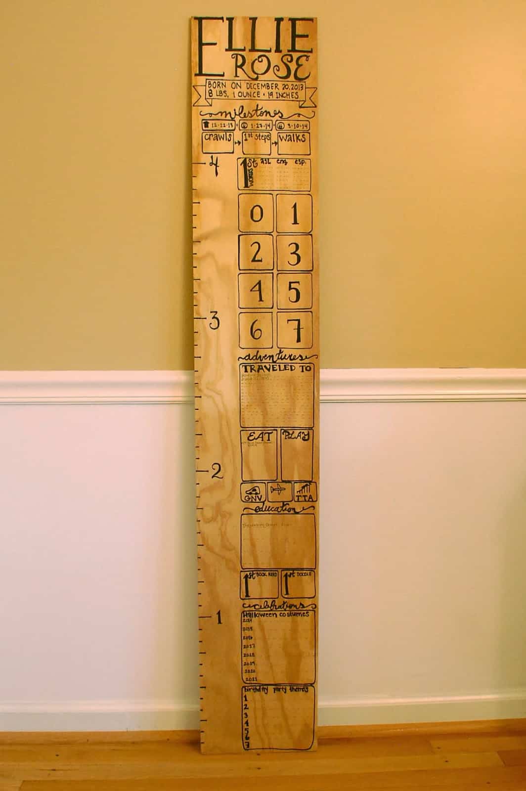 DIY wooden growth chart and milestone memory board