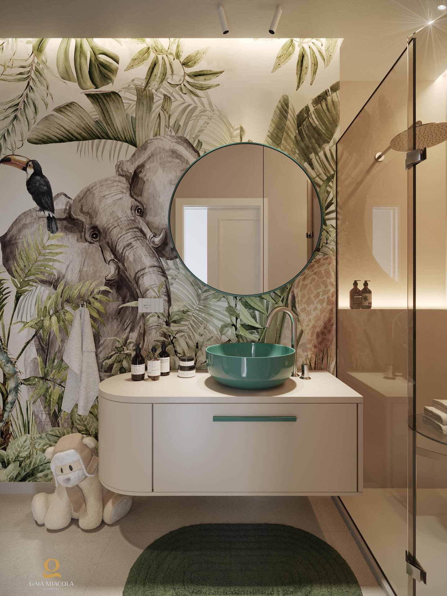 Jungle themed kids' bathroom with watercolor elephant and toucan mural, round mirror, green bowl vessel sink, and curved cream floating vanity