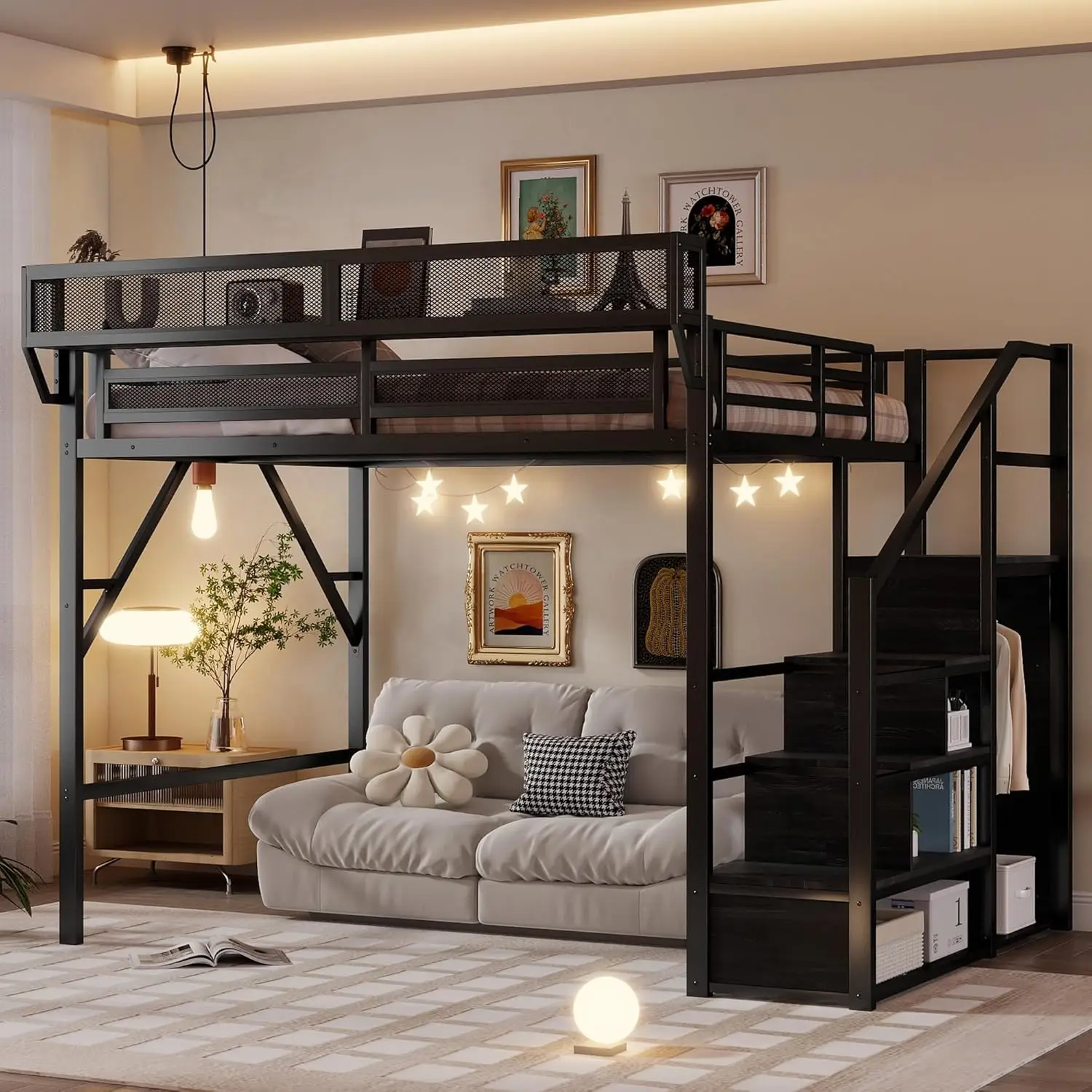 Alt: Black metal loft bed above a plush cream tufted sofa with a daisy pillow and houndstooth pillow, warm floor lamp, framed sunrise art and star string lights in a warm neutral room