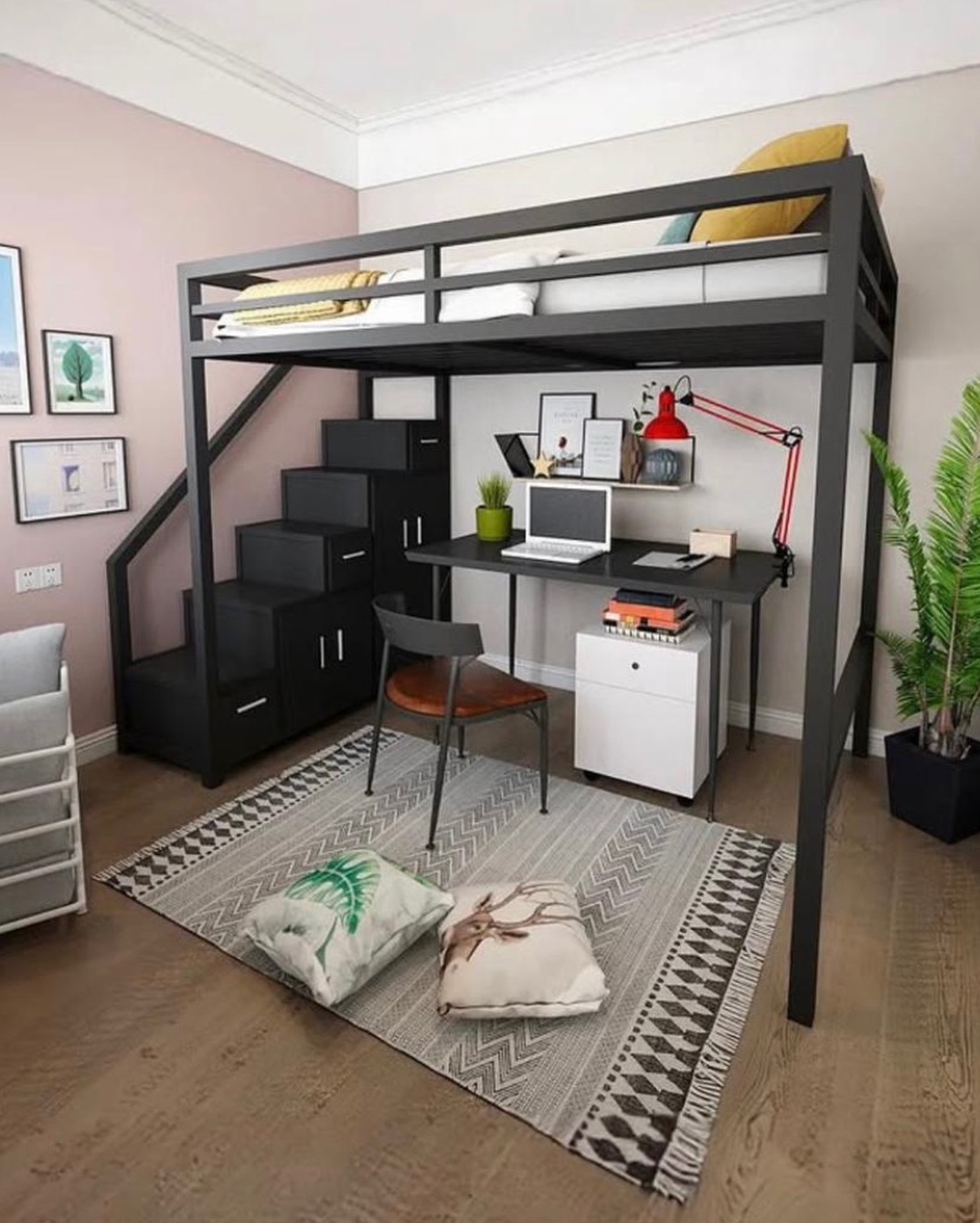 Alt: Black metal loft bed with staircase that doubles as drawer and cabinet storage, and a black workspace with red articulating lamp and laptop underneath against a soft pink wall