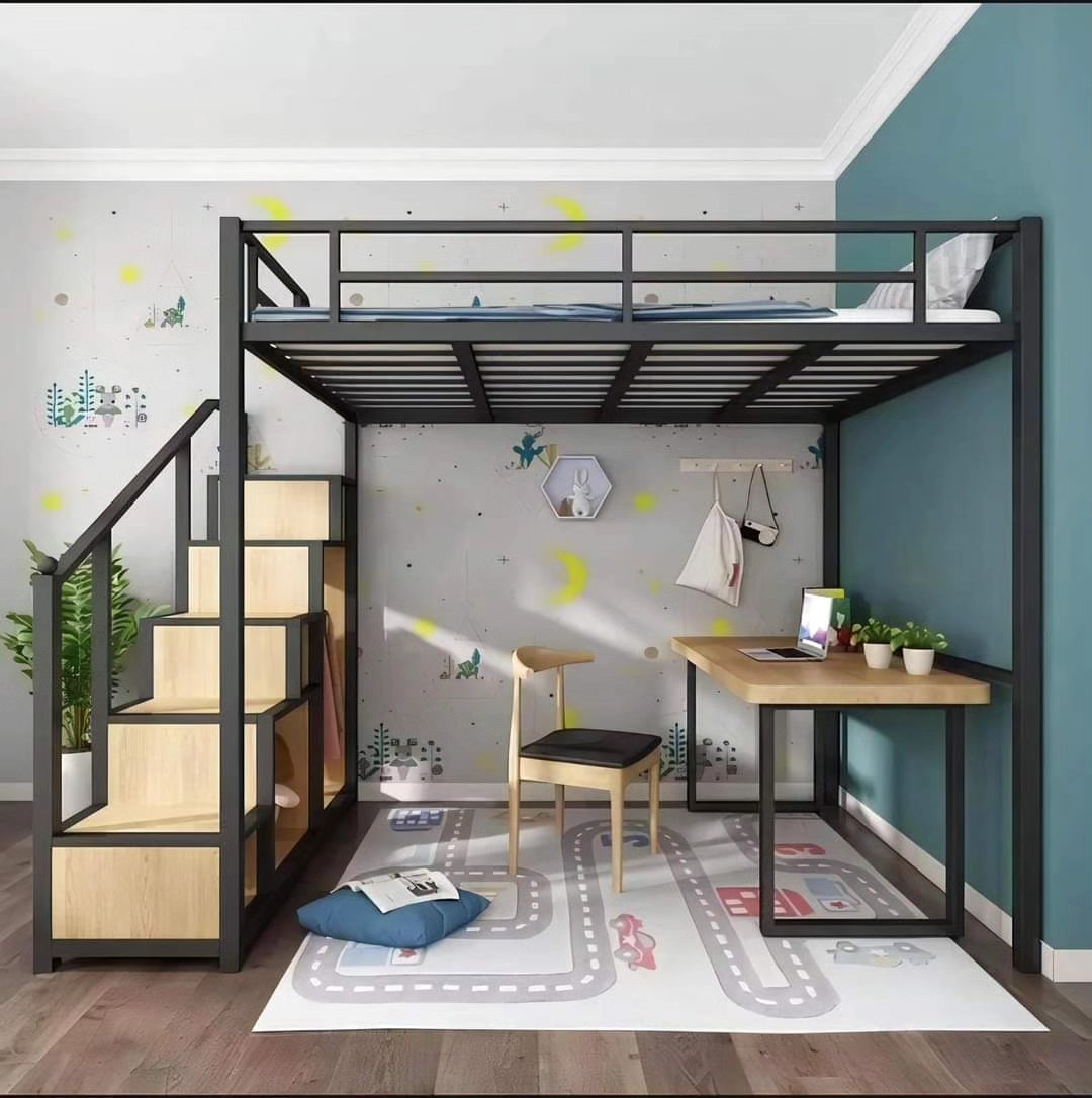 Alt: Black metal loft bed with wooden stepped staircase above a wood kids desk, yellow chair and road-print play rug against a teal accent wall