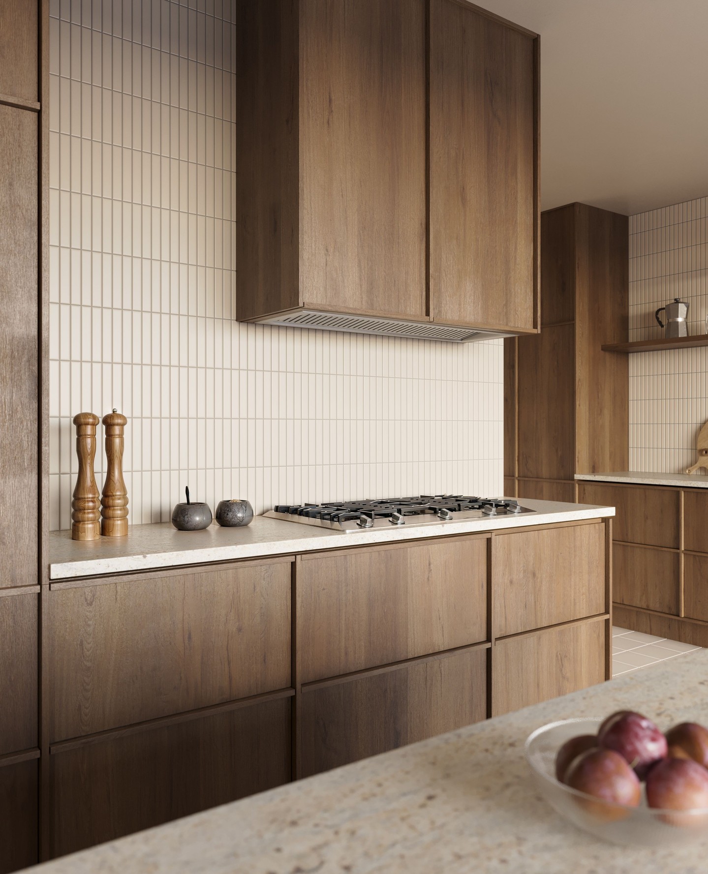 Modern oak flat panel kitchen cabinets with a vertical white kit kat tile backsplash, speckled cream stone countertop and wooden pepper mills
